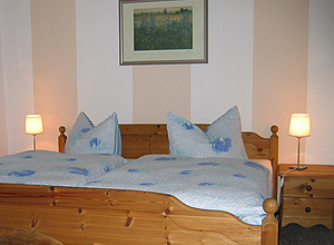 Schlafzimmer in der kleinen Ferienwohnung